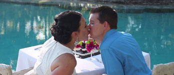 Colin and Renata kissing in the St. Regis Hotel